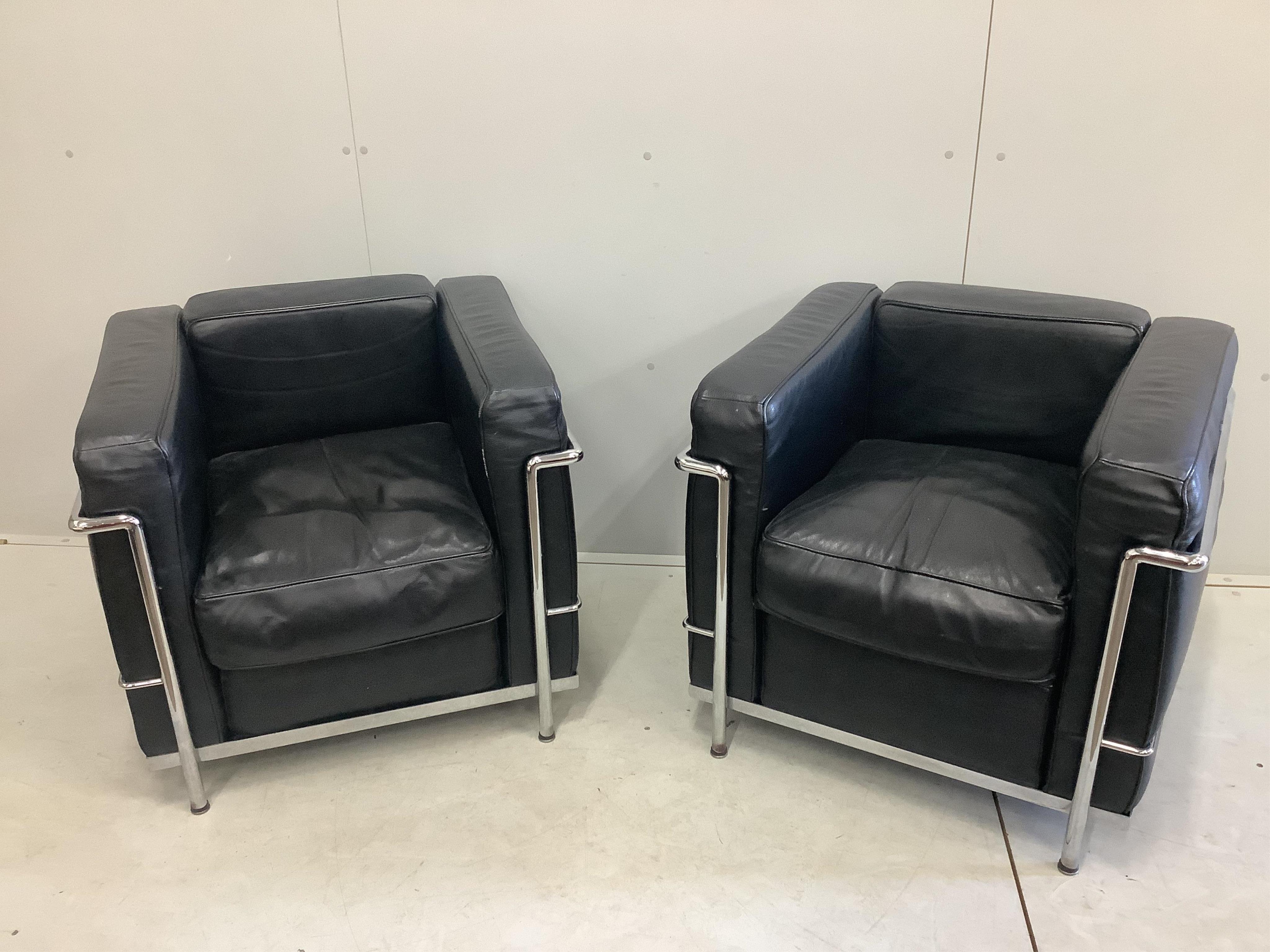 A pair of Corbusier style chairs, width 75cm, depth 68cm, height 66cm. Condition - fair